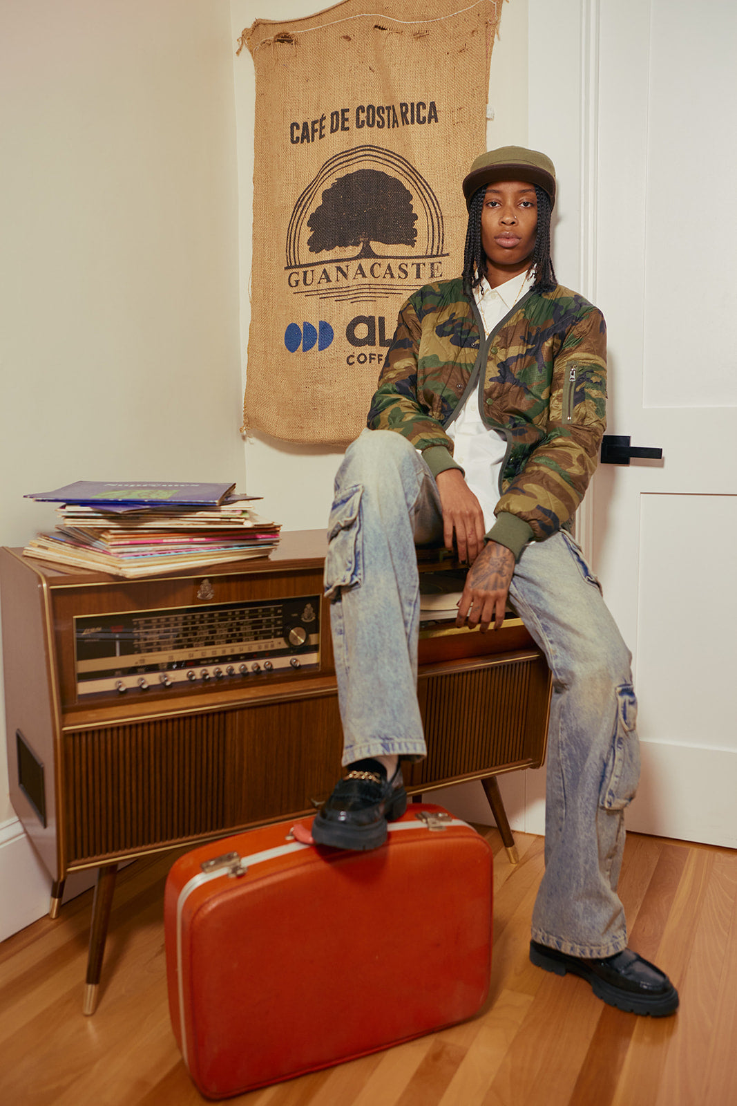 an influencer wearing few and far cap merch