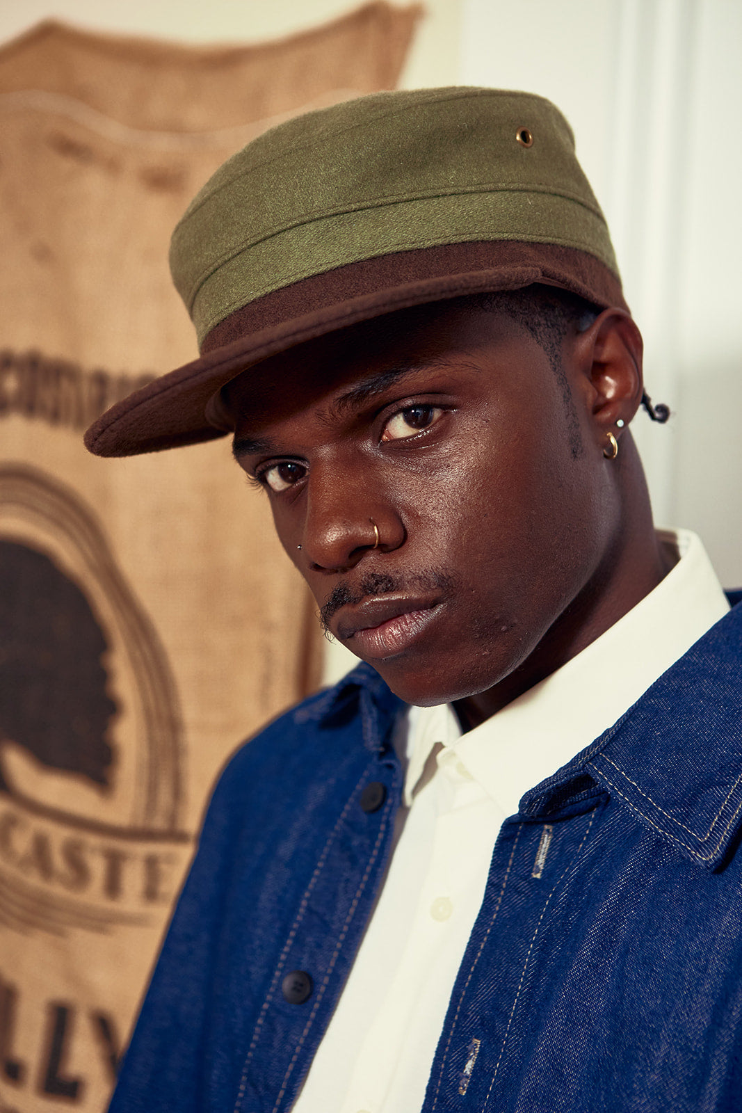 an influencer wearing few and far cap merch