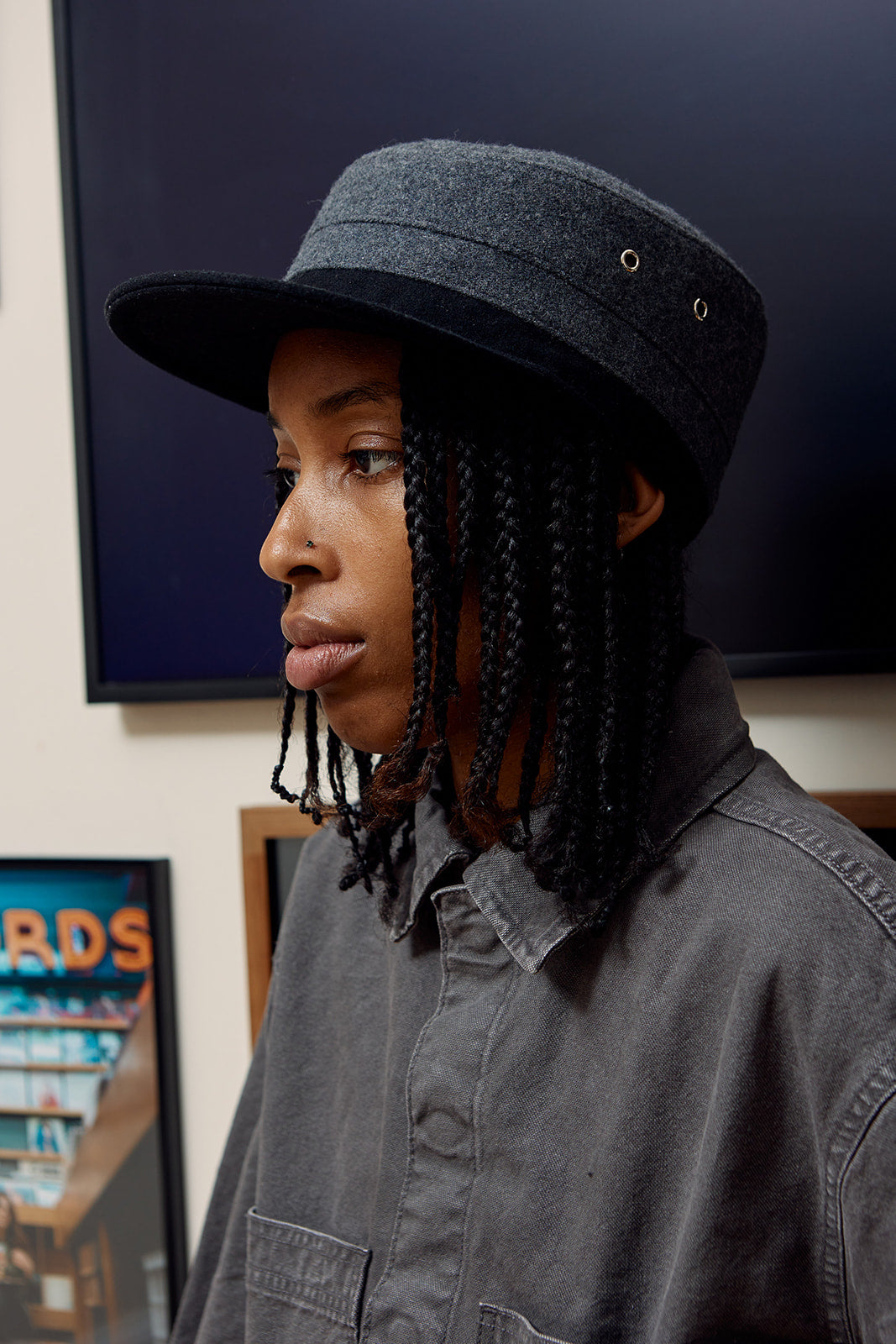 an influencer wearing few and far cap merch